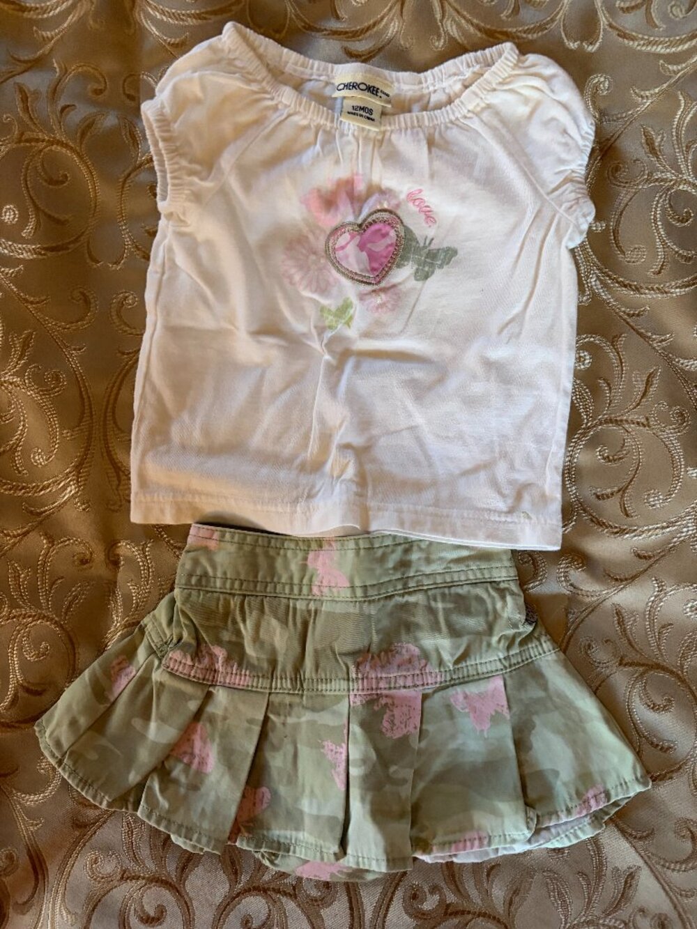 Cherokee pink and green skort with matching shirt, size 12 months